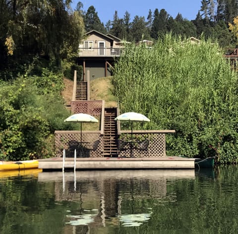 Planning for next summer? Don't wait! Idle Hour has one of the best spots on the river! View of home and seasonal dock from the river.