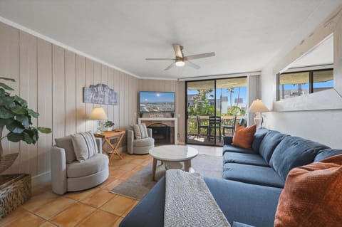 Cozy up by the fully functional gas fireplace during cooler evenings, or simply enjoy the inviting ambiance after a day at the beach.