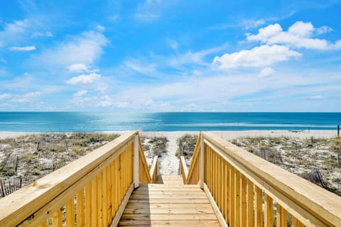 Private boardwalk leads you directly to the sand