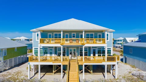 A multifamily, Gulf front home located in the Morgantown Community of Fort Morgan