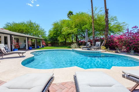 Enjoy the beautiful pebble-tec pool with 8 chaise lounges surrounding-