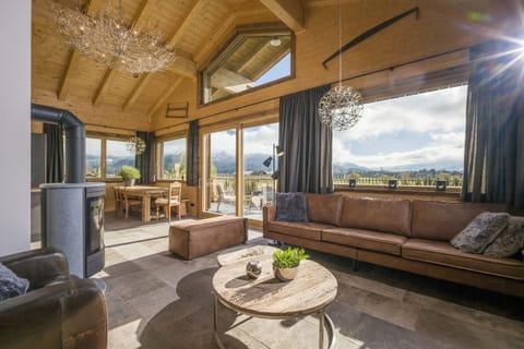 0-inch flat-screen TV with satellite channels, TV, heated floors