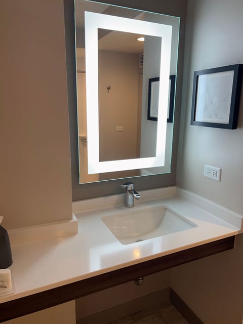 Bathtub, eco-friendly toiletries, hair dryer, towels