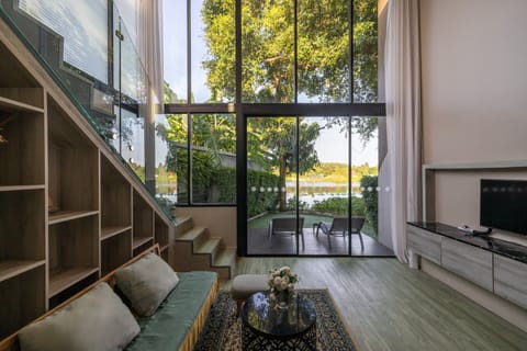 Family Two Bedroom Front Lake View | Down comforters, in-room safe, desk, laptop workspace