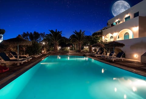 Seasonal outdoor pool, open 9 AM to 9 PM, pool umbrellas, sun loungers