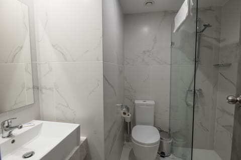 Shower, free toiletries, hair dryer, towels