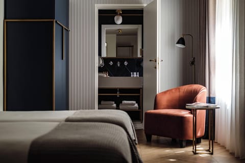 Deluxe Room | Premium bedding, minibar, in-room safe, individually decorated