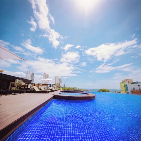 Outdoor pool, open 6 AM to 10 PM, sun loungers