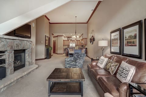 Condo, 4 Bedrooms | Living room | 1-inch TV with cable channels, fireplace, DVD player