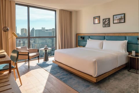 Down comforters, pillowtop beds, in-room safe, desk