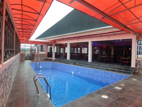 Outdoor pool, pool umbrellas, sun loungers