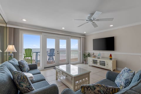 Relax in your spacious living room with ocean views, comfortable seating, and coastal decor that makes you feel right at home by the sea.