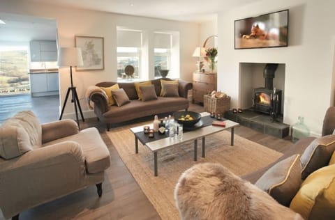 Ground floor: Cosy sitting room with wood burning stove
