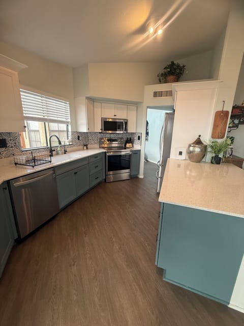 Roomy kitchen with plenty of space for food prep.