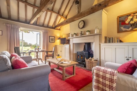 Sitting and dining area with exposed beams