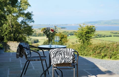Enjoy the spectacular coastal views from the raised terrace