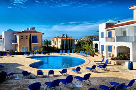 Large communal 'shell shaped' pool with plenty of space to unwind and sun bathe.