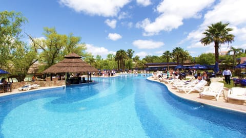 Indoor pool, outdoor pool, pool umbrellas, sun loungers