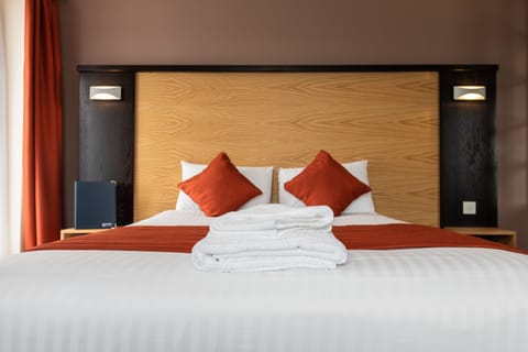 Desk, laptop workspace, free WiFi, bed sheets