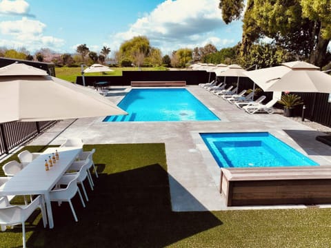 Outdoor pool, open 9:00 AM to 7:00 PM, pool umbrellas, sun loungers