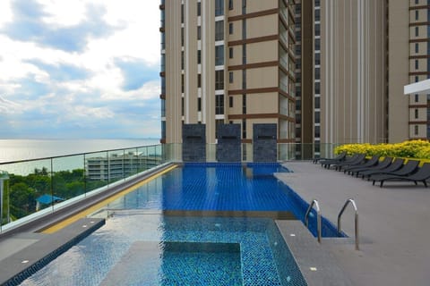 Outdoor pool, a rooftop pool, sun loungers