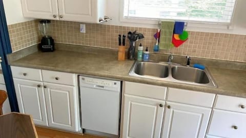 galley kitchen with dishwasher