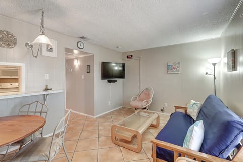 Relax in your bright, open living space with comfortable seating and entertainment area perfect for unwinding after beach adventures.