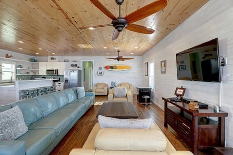 Living room - Living room with large mounted TV and a tabletop arcade!