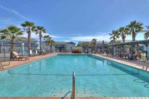 Dive into crystal-clear waters surrounded by swaying palms and comfortable loungers where you can soak up the sunshine all day long.
