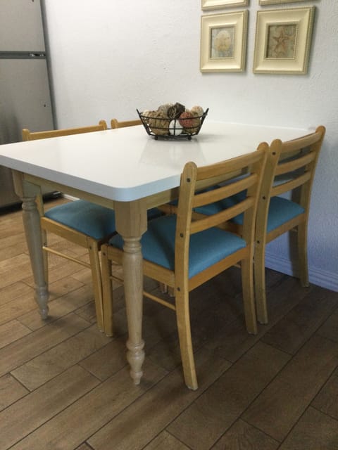 New, custom made kitchen table with quartz countertop.