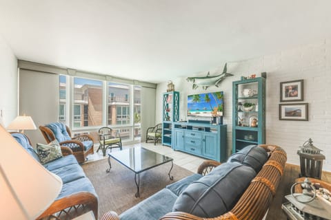 Sink into coastal comfort in this charming living room where nautical touches and ocean-inspired décor create your perfect beach retreat.