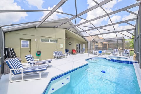Large Pool sitting area with plenty of chairs, tables and lounges
