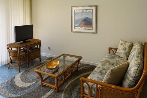 Relax in your inviting living space featuring island-inspired decor, comfortable seating, and entertainment amenities—your perfect home away from home in Maui.
