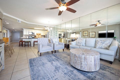 Spacious living area with comfortable seating, a stylish coffee table, and a view that invites you to unwind