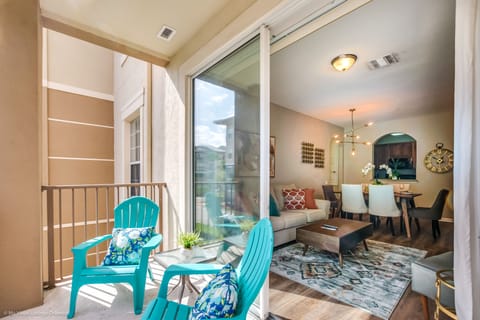 Seamlessly connecting indoor and outdoor living, a sliding door next to the living space leads to the inviting terrace, creating a perfect blend of comfort and nature.