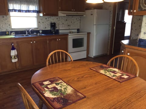 Eat in the kitchen or on the back deck!