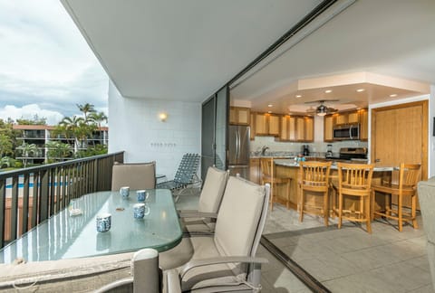 Sip your morning coffee on your private balcony overlooking the lush tropical surroundings, then step inside to your fully equipped kitchen and spacious dining area, ready for your island getaway.