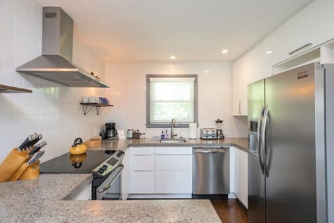 Full kitchen with stainless steel appliances - has everything you need to cook your favorite meals.