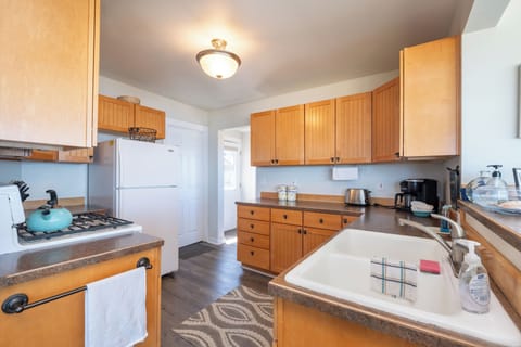 Fully stocked kitchen - Nicely stocked kitchen with oceanfront views.