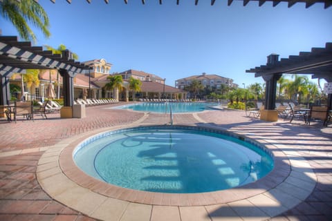 Escape to the ultimate outdoor pool retreat of the resort in Orlando - Every splash is a moment of bliss with fresh water throughout your stay - Magnificent Dinning arrangement under the shades - Cozy beach chairs available for having a sunbath