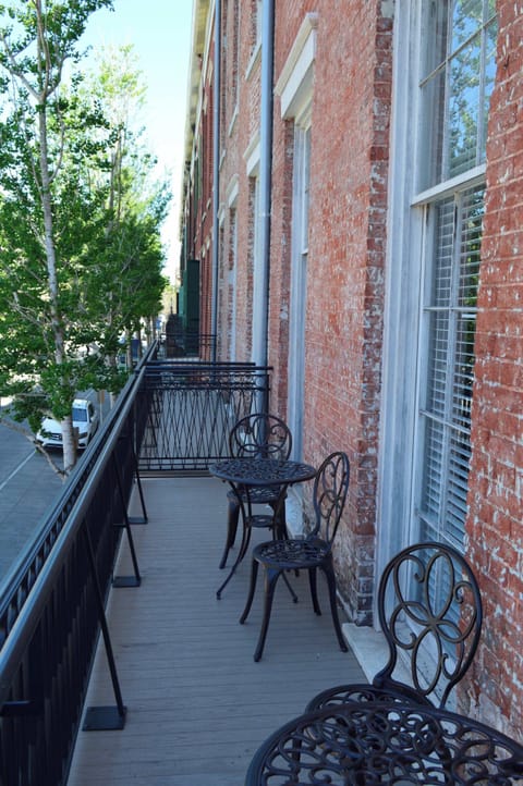 corner condo, with wrap around balcony on Julia St and on St. Charles Ave. 