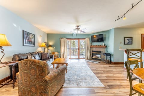 Sink into plush leather seating by your crackling fireplace, while natural light pours through French doors leading to your private balcony.