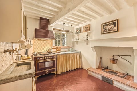 Wood, Flooring, Interior Design, Kitchen, Home, Floor, Kitchen Stove, Cabinetry, Stove, Room