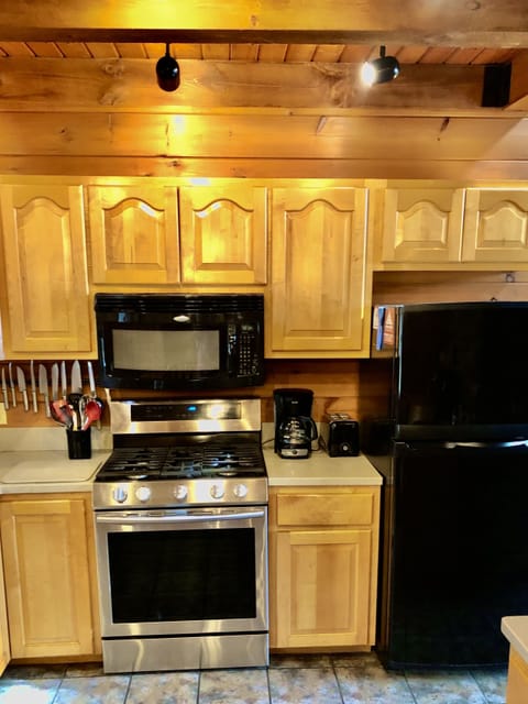 The gas stove and full-size refrigerator and freezer are available for use.