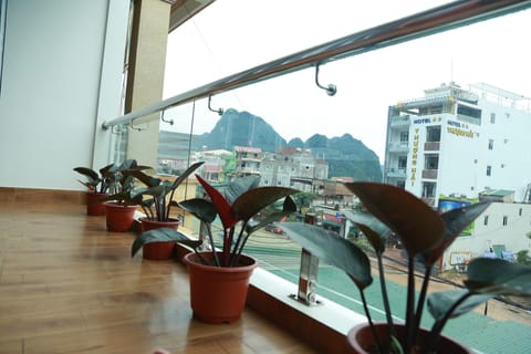Standard Triple Room, Balcony, City View | Balcony