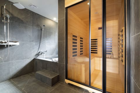 Presidential Studio Suite, Multiple Beds, Hot Tub | Bathroom | Hair dryer, bathrobes, slippers, towels