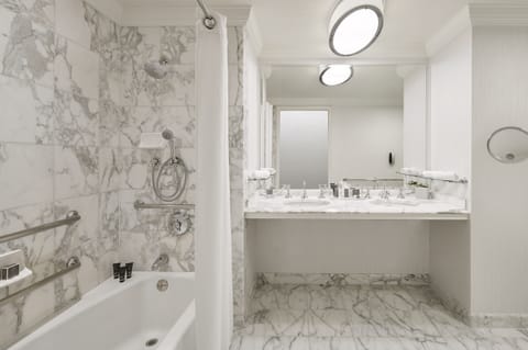 Designer toiletries, hair dryer, bathrobes, slippers