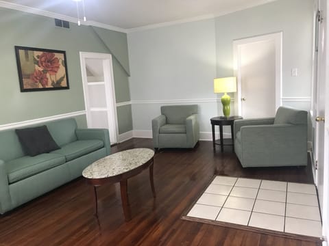 Deluxe Apartment, 2 Bedrooms, Kitchen, City View (Shared Balcony, A02) | Living room | Flat-screen TV