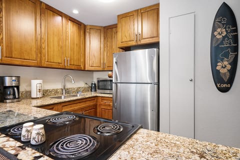 Many new appliances with all necessary cookware.