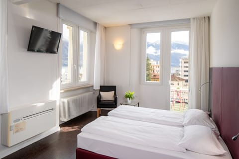 Superior Double or Twin Room | Minibar, in-room safe, desk, laptop workspace